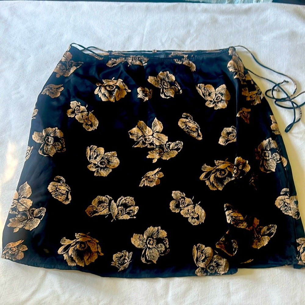 Banana Republic 100% silk wrap mini skirt with gold rose print.